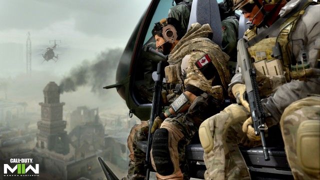 Modern Warfare 2 players sitting on side of helicopter