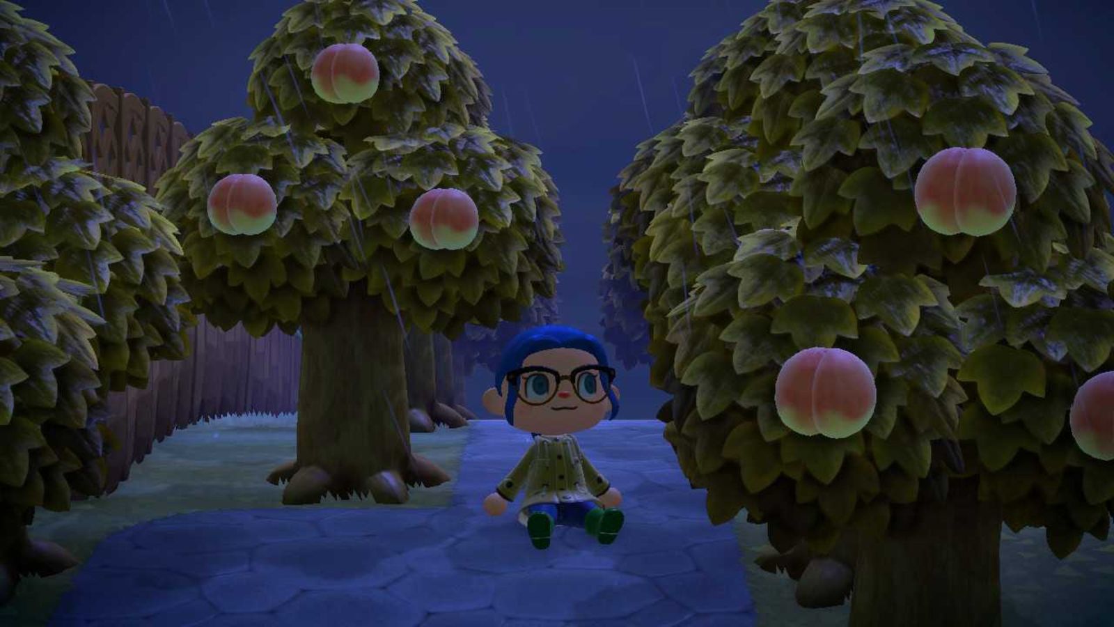 A player in Animal Crossing: New Horizons sitting amongst some peach trees.