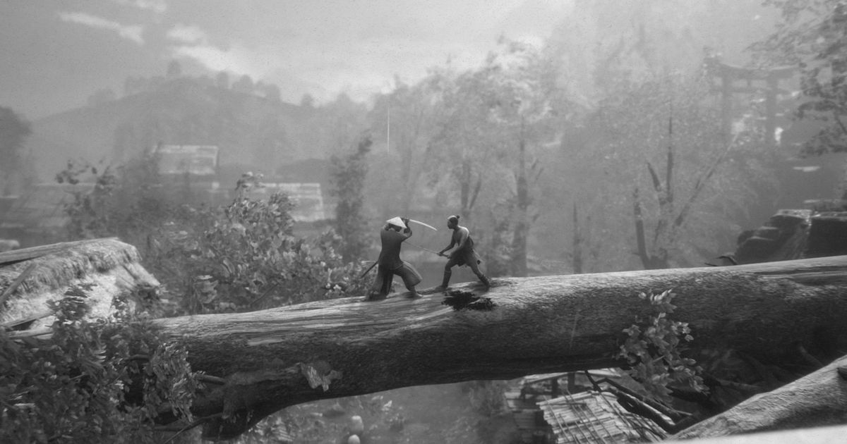 Two warriors fight on top of a fallen tree.