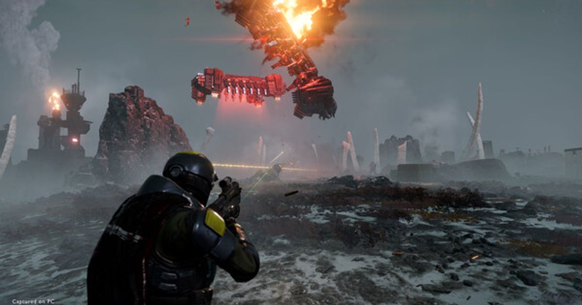 A Helldivers 2 screenshot showing a member of the armed forces preparing to shoot at an enemy