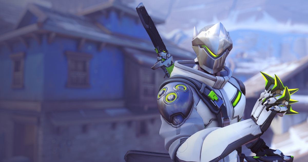 Genji stood in front of a blue building, holding his shuriken, in Overwatch 2.