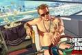 GTA Online Ill Gotten Gains official artwork. Man in speedboat holding golden gun and a bag of money is behind him. The money is flying everywhere.