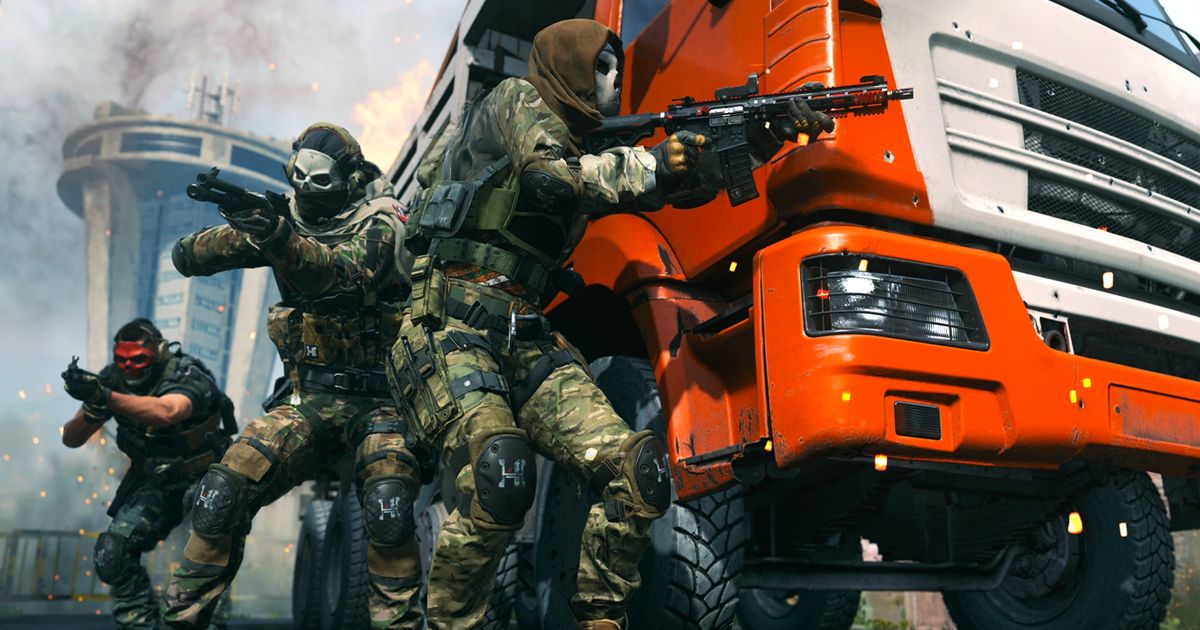 Billede, der viser moderne krigsførelse 2 spillere, der tager dækning bag lastbil