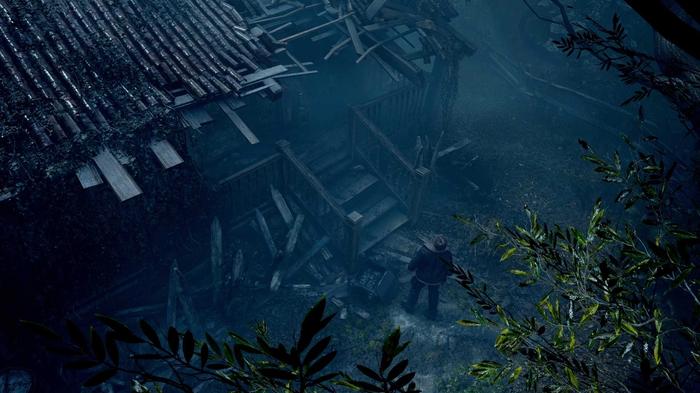 Leon S. Kennedy looking up at a destroyed house in Resident Evil 4 remake.