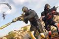 Warzone players aiming guns and wearing ranked play skins