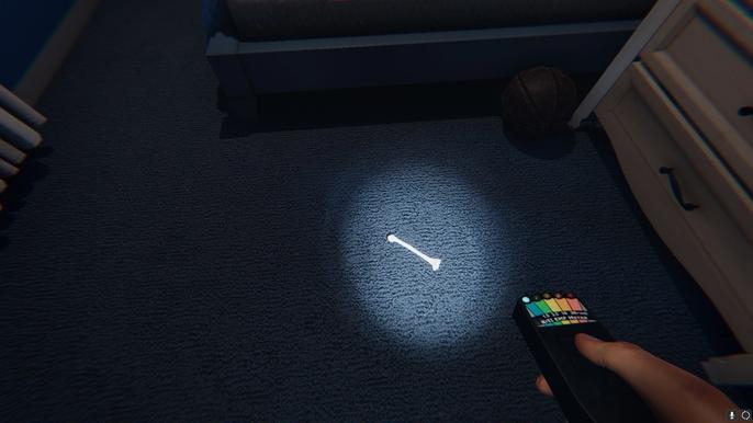 A bone on the floor of one of the bedrooms in Phasmophobia.