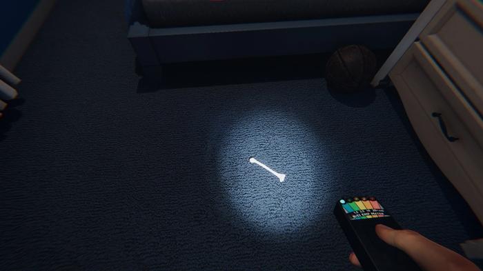 A bone on the floor of one of the bedrooms in Phasmophobia.