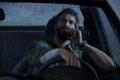 Image of Joel driving a car in The Last of Us Part I.