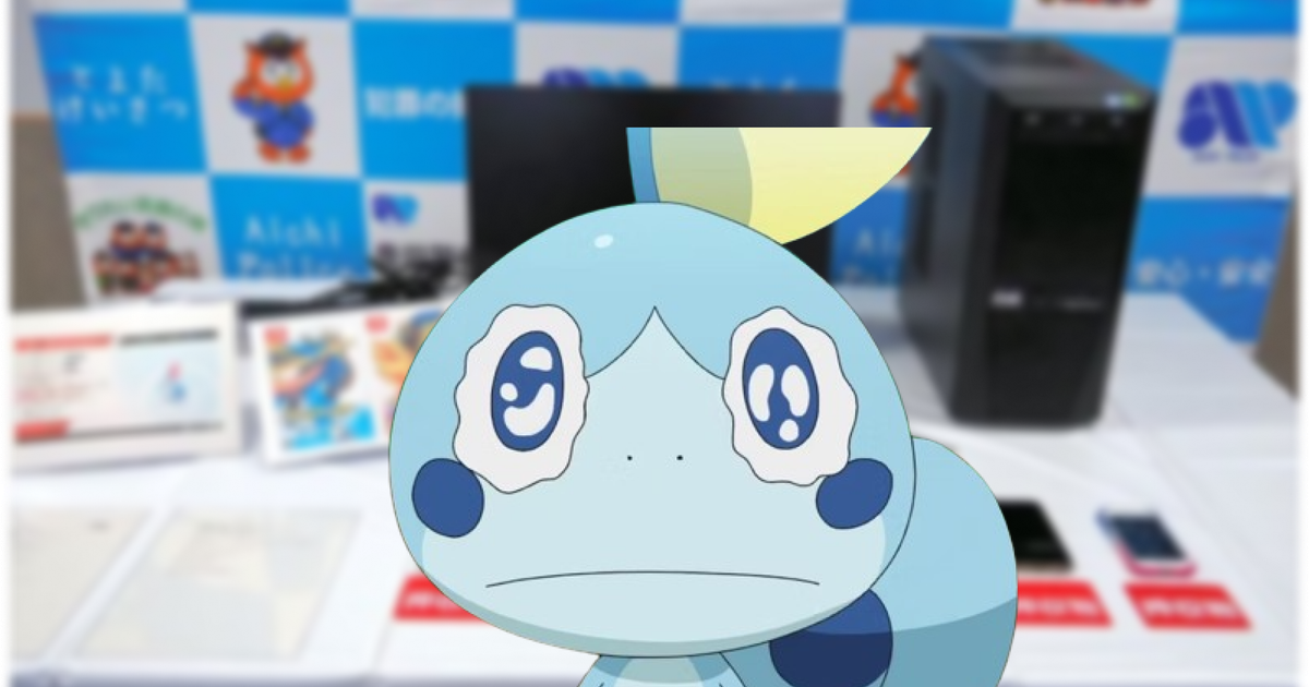 sobble blue lizard pokemon crying in front of nintendo stand