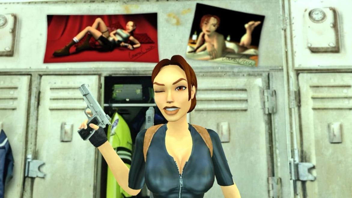 tomb raider lara croft winking in front of sexy pinup posters
