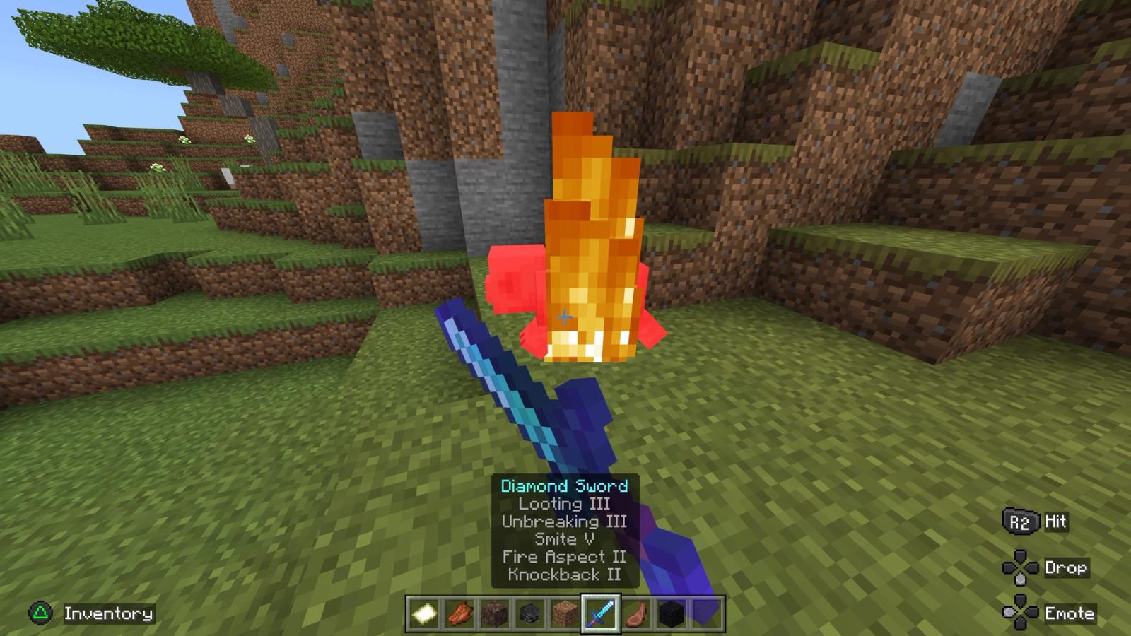 Setting a pig on fire in Minecraft with a Fire Aspect-enchanted sword