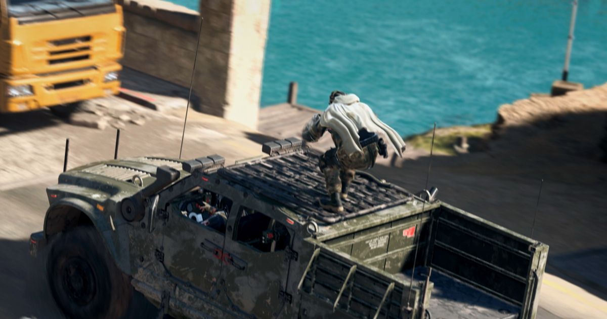 Image showing Warzone 2 player standing on moving SUV