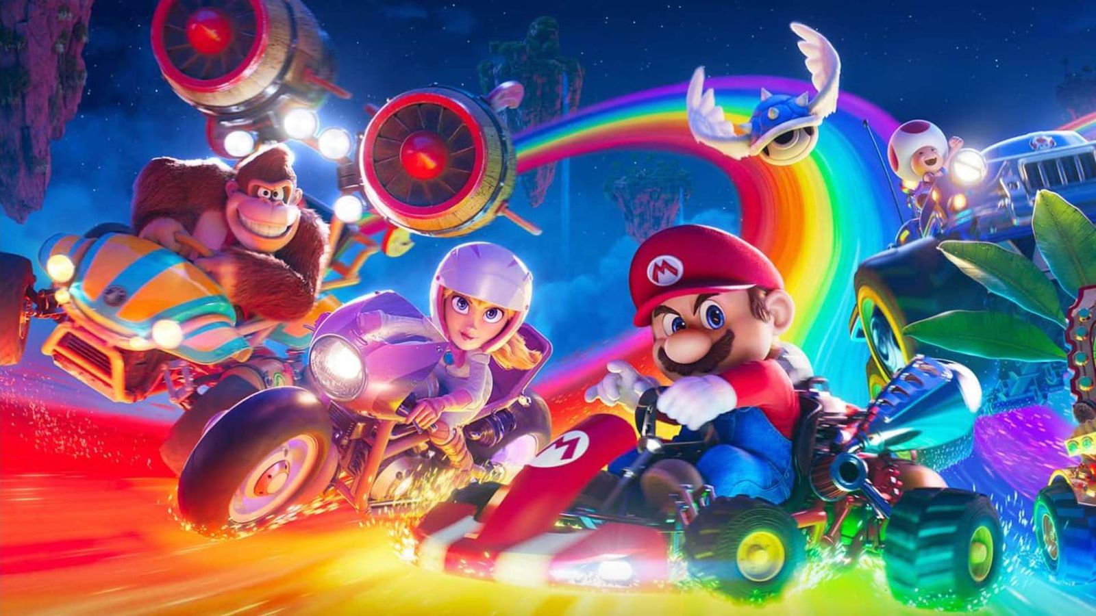 Mario and his friends race across Rainbow Road in the Mario Movie