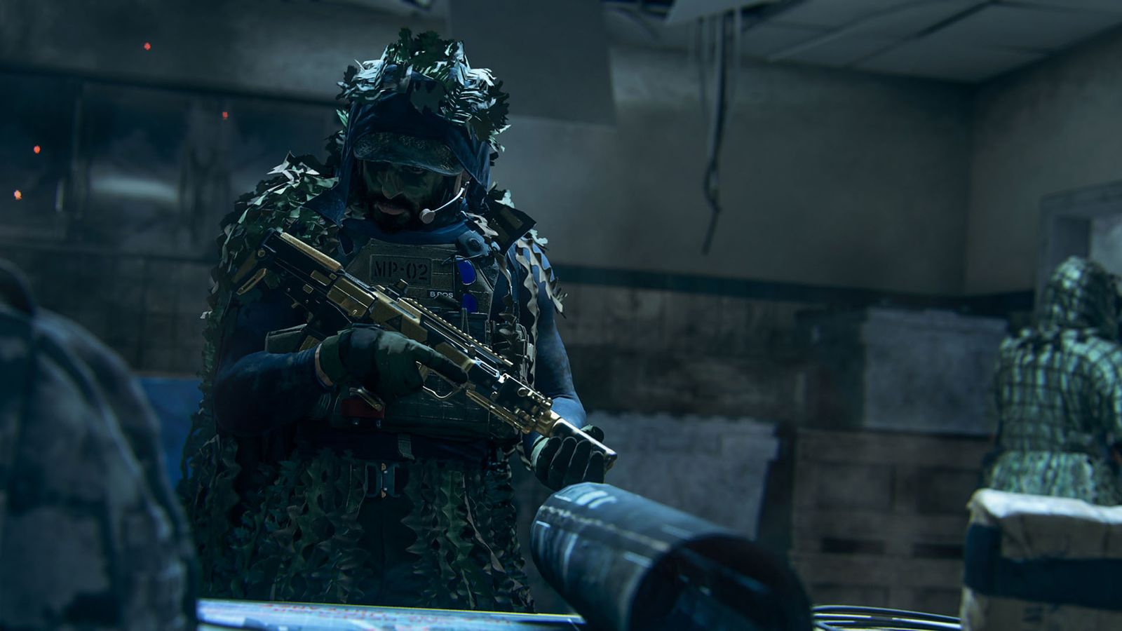 Screenshot of Modern Warfare 2 player wearing a ghillie suit and holding gun while standing next to rolled up blueprint on a table
