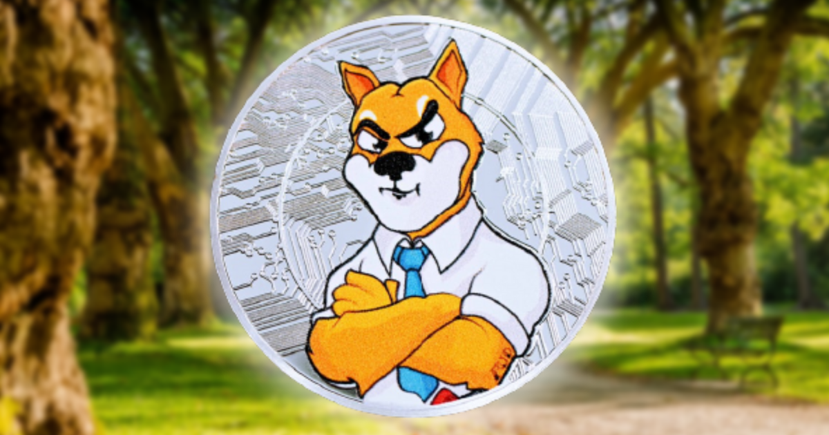 Silver coin with a Shiba Inu dog in a shirt, against a blurred background of a green park.