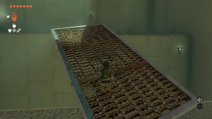 Link walking along a metal grate in Zelda Tears of the Kingdom.