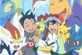 Ash and Goh surrounded by their Pokemon teams