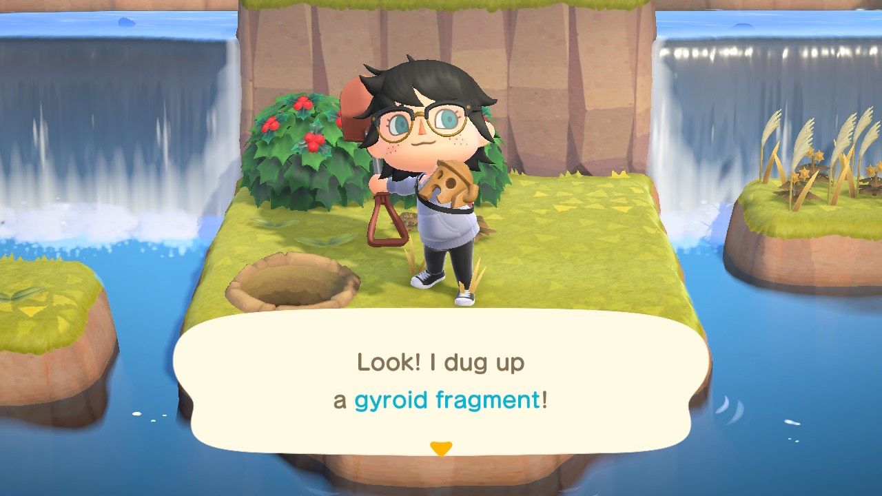 A player having dug up a Gyroid Fragment in Animal Crossing: New Horizons.