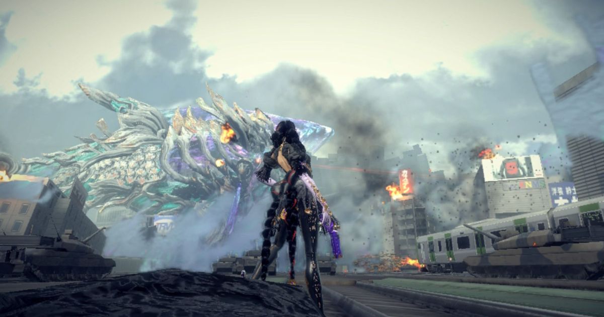 Bayonetta against a backdrop of a destroyed city