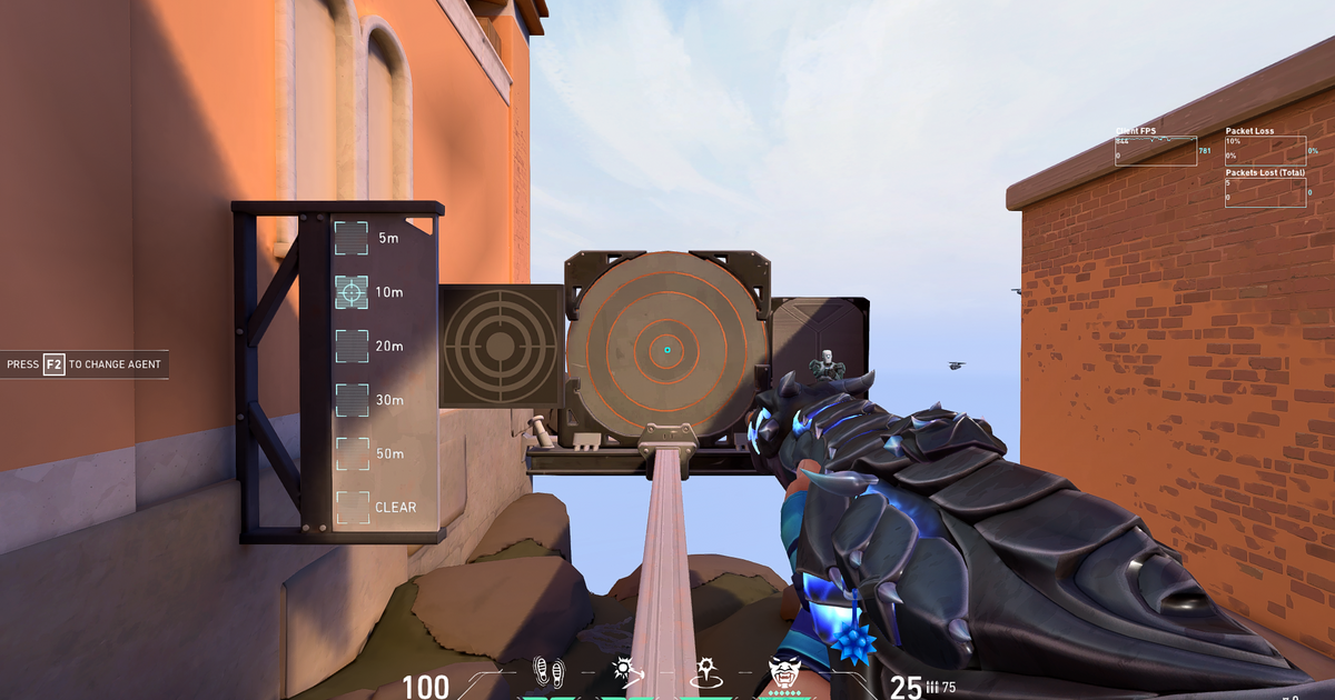 This image shows the Elderflame Vandal with a circular crosshair being used during training in Valorant.