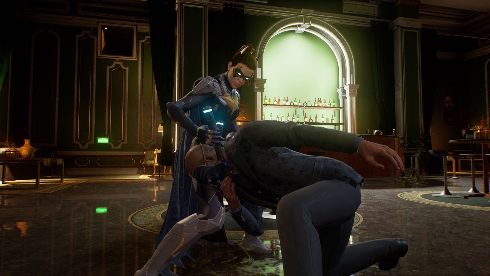 Batgirl performing a silent takedown in Gotham Knights.