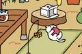 Screenshot from Neko Atsume, showing a white cat rolling on a mat with a rubber ball