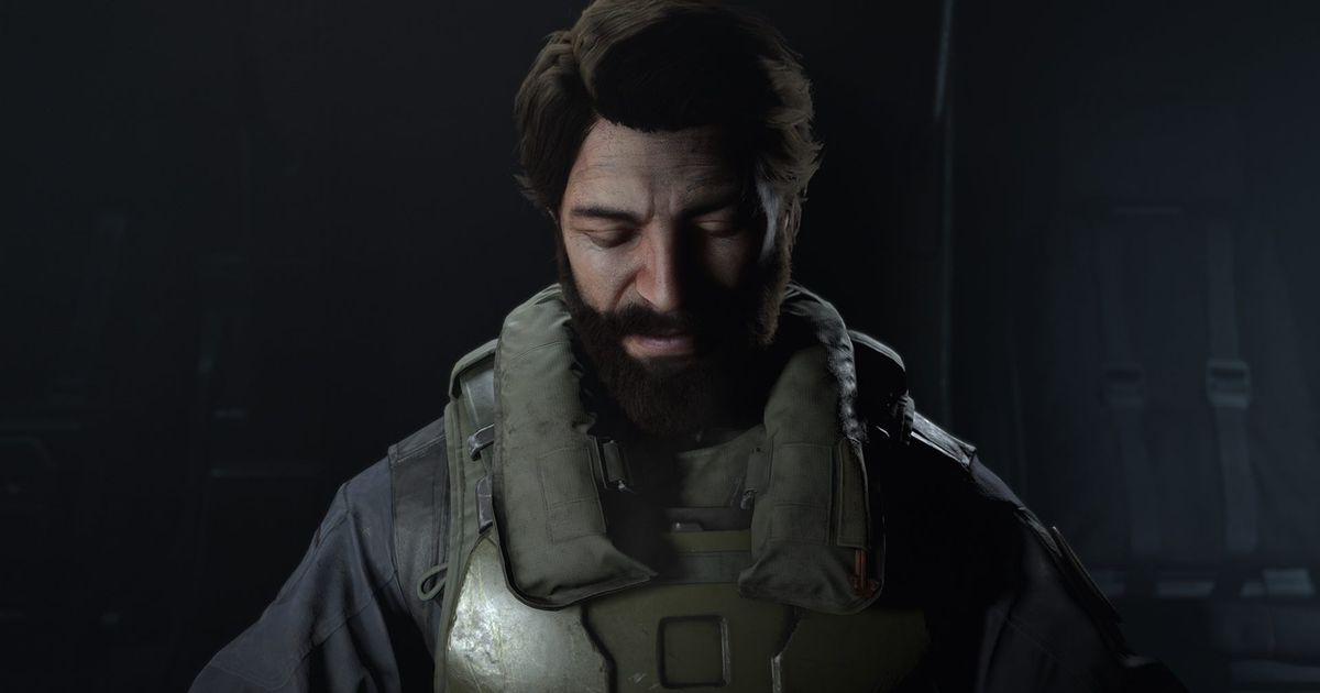 The Pilot from Halo Infinite looks forlornly downwards.