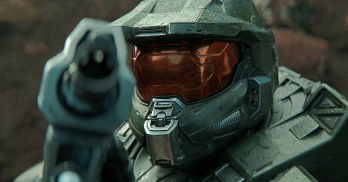 A close-up profile shot of master chief aiming an MA5B Assault Rifle 