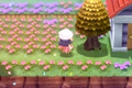 A Pokémon Trainer interacting with a honey tree in Pokémon Brilliant Diamond and Shining Pearl, where bug-types Burmy and Wormadam can be attracted,