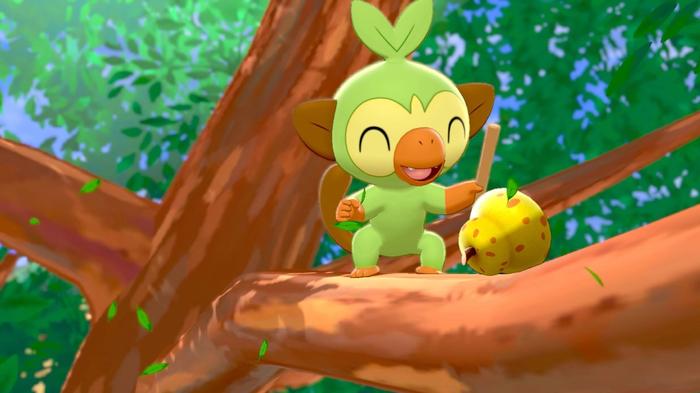 Grookey stood in a tree in Pokemon Sword and Shield