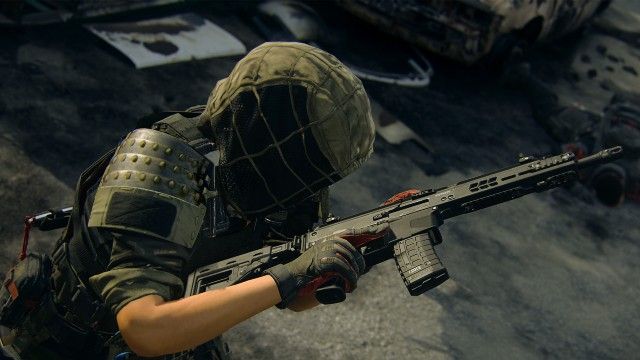 Screenshot showing Modern Warfare 2 player wearing ghillie suit and holding assault rifle