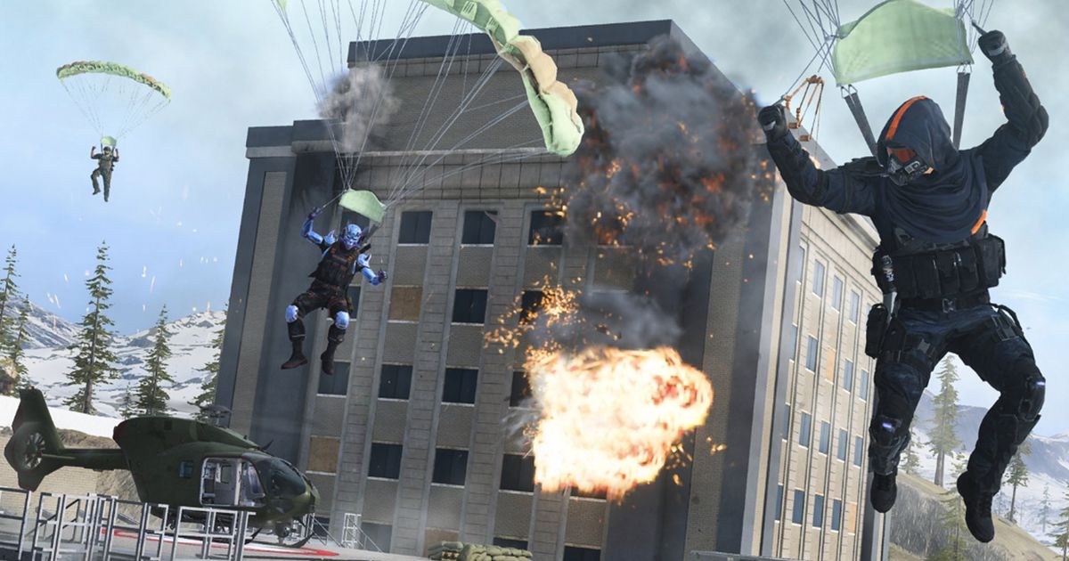 Warzone Mobile players landing to ground using parachute with exploding building in background