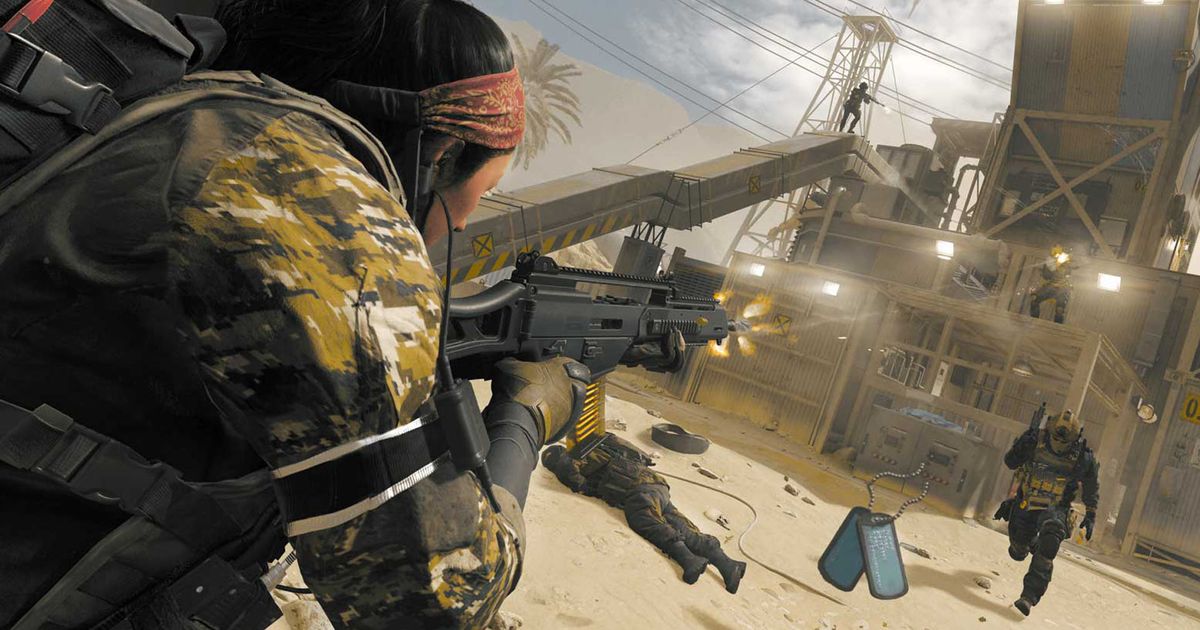 Modern Warfare 3 player aiming with assault rifle with player running towards dog tag in background