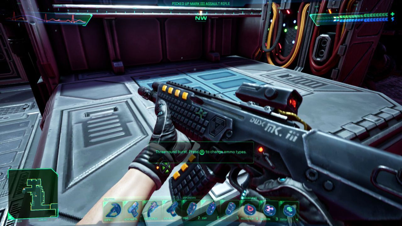 The player character holding a gun in the System Shock remake.