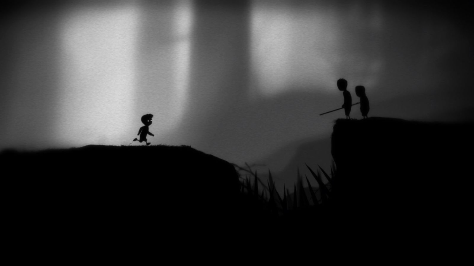 Screenshot from Limbo, showing the protagonist running towards two people on the other side of a gulf