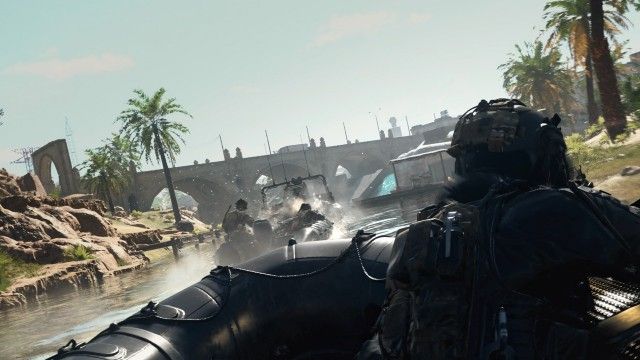 Screenshot of Warzone player in a boat shooting at other players in a boat in the background