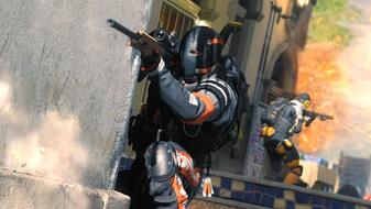 Modern Warfare 3 player aiming down sights of gun while peeking round corner