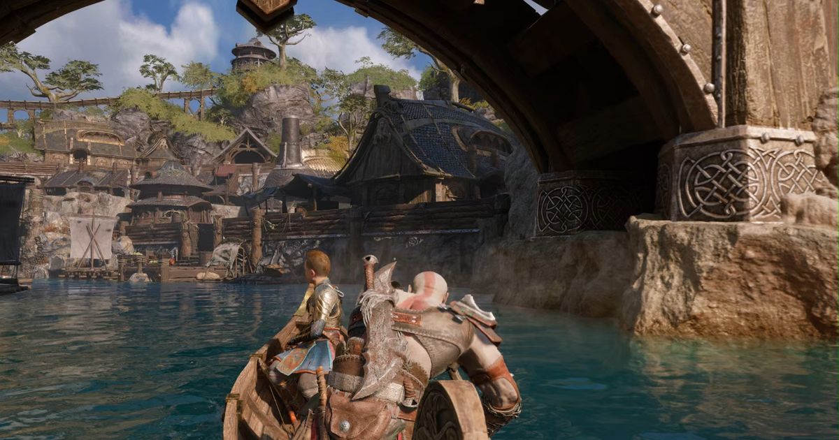 Kratos and Atreus in a boat in God of War Ragnarok