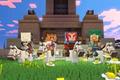 Minecraft Legends characters stood in front of a base.
