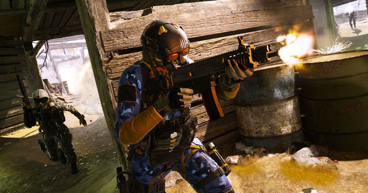Modern Warfare 3 player firing assault rifle inside bunker with sprinting teammate in background