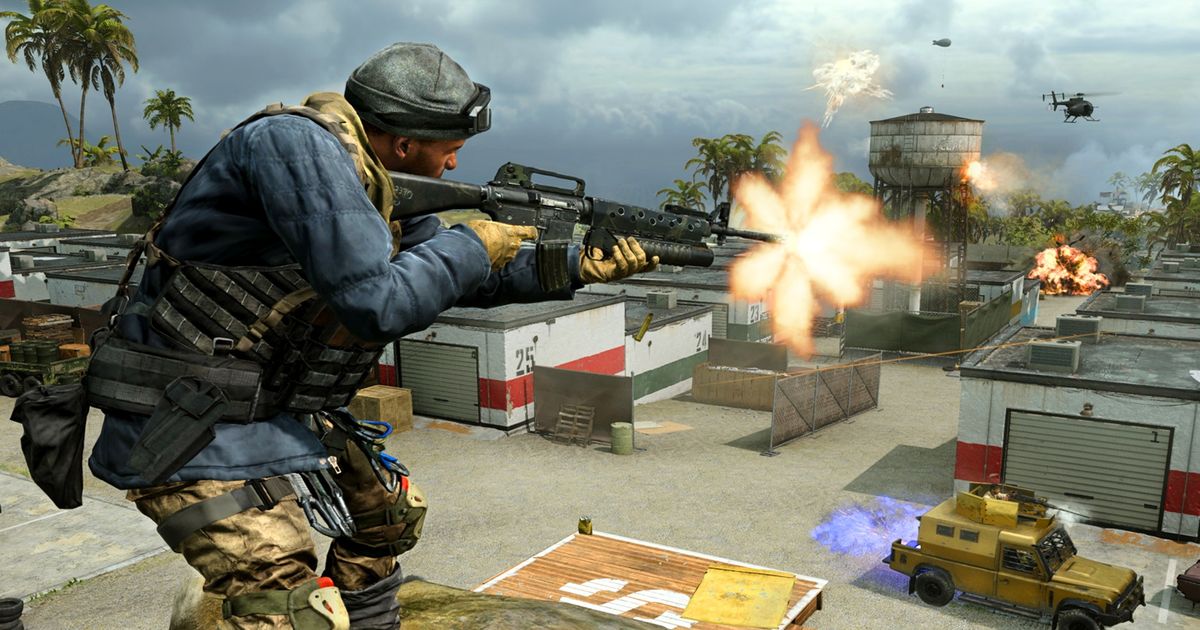 Image showing Warzone player firing gun while standing on rooftop