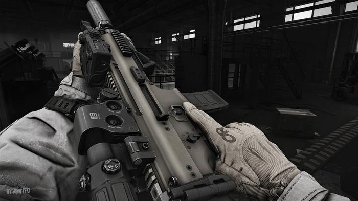 The player reloading a weapon in Escape from Tarkov.