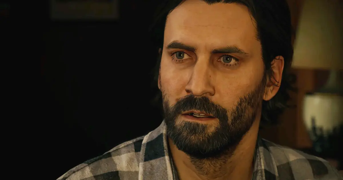 Alan Wake 2: Alan stood in front of a lamp with his mouth open