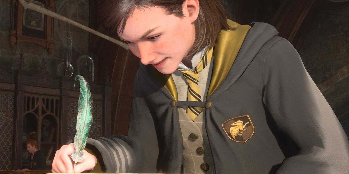 A student writing into a notebook with a quill in Hogwarts Legacy.