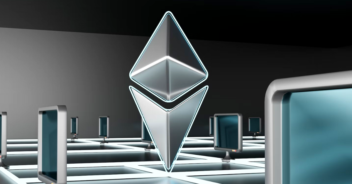 Ethereum logo next to computers.