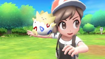 A Pokémon Let’s Go Johto mockup of Togepi jumping off a trainer’s arm