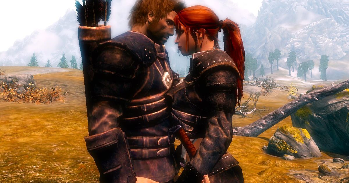 A creek with running water against a sunset in Skyrim, with a masculine and feminine character holding hands about to kiss.