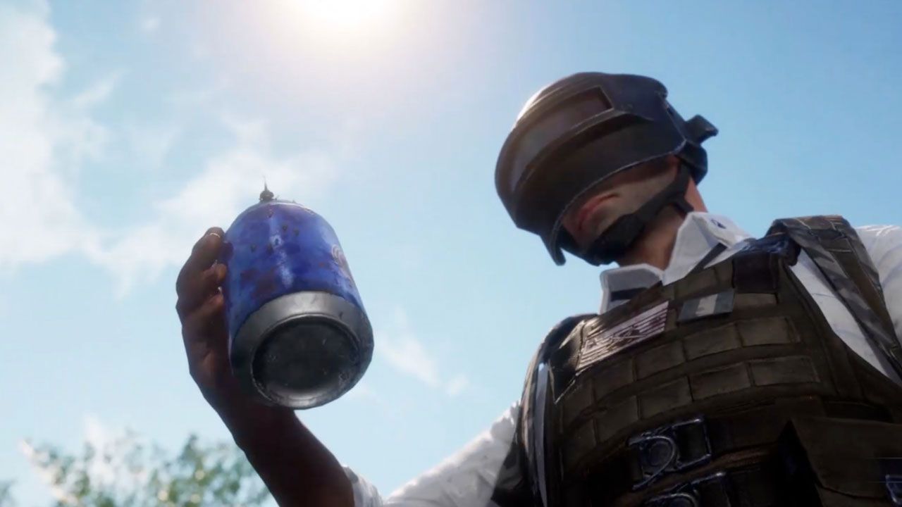PUBG Man holding a drinks can with another, smaller player on top of it.