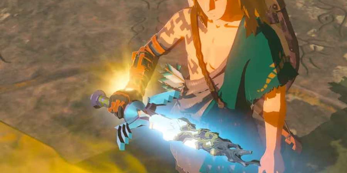 Link holding the Master Sword weapon in Zelda Tears of the Kingdom.