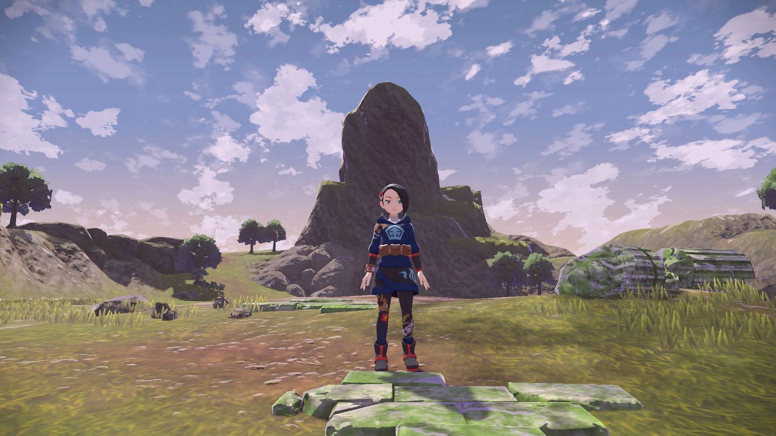 A Pokémon Trainer in one of the open-world areas of Pokémon Legends: Arceus.